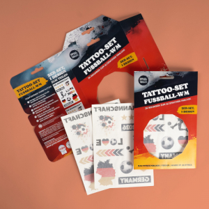 stainer aussteller textbild 300x300 - <span class="color-black">Print Tattoo by Stainer (H, B2)</span><br>Marken auf der Haut